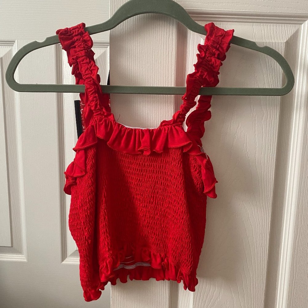 Smocked red shirt